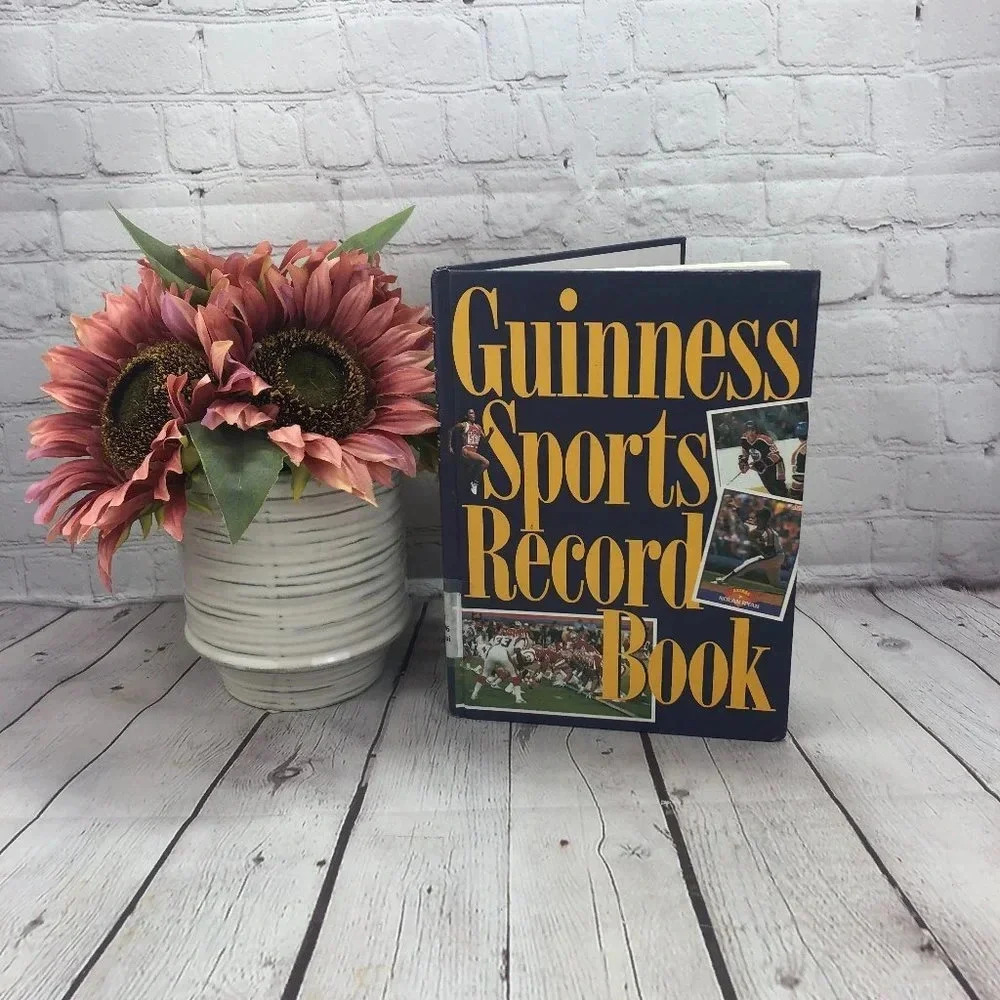 vintage book Guinness sports record book 1990-91